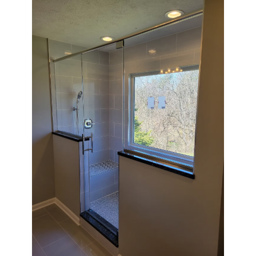 Heavy glass frameless pivot door with window view