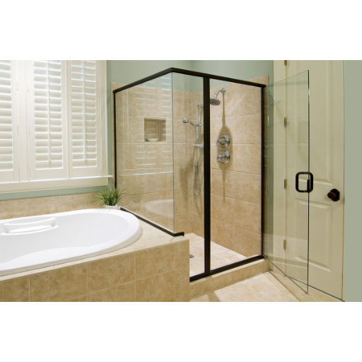 Semi-frameless corner enclosure with clear glass and dark hardware next to bathtub